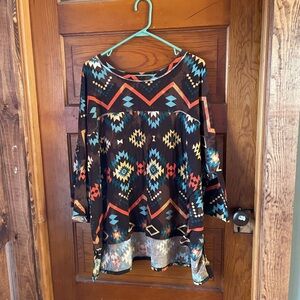 Tribal Print top with Vibrant Colors.  Oversized high low New without tags.